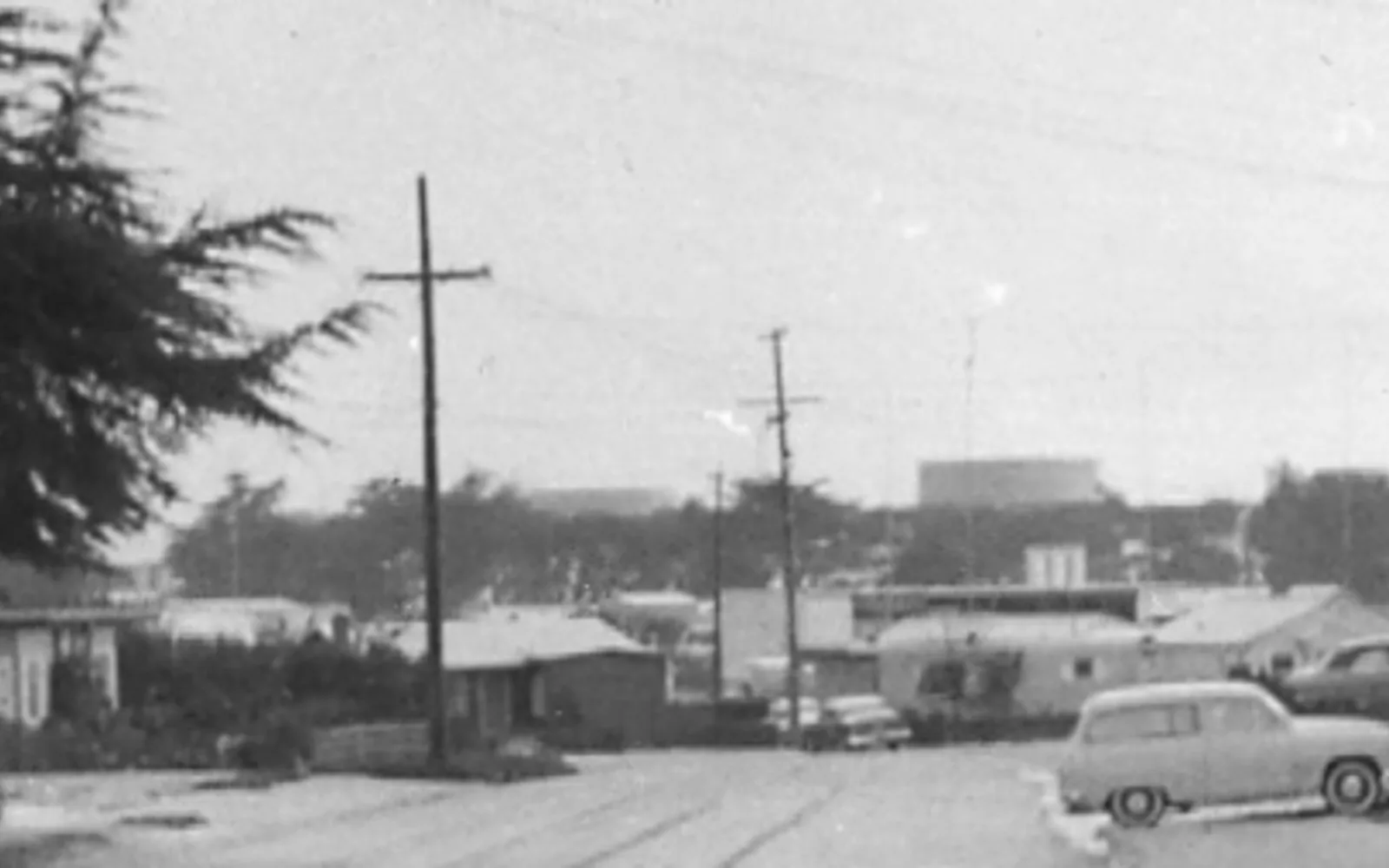 Residential street on Hamilton Avenue in Seaside during snowfall in January 1962